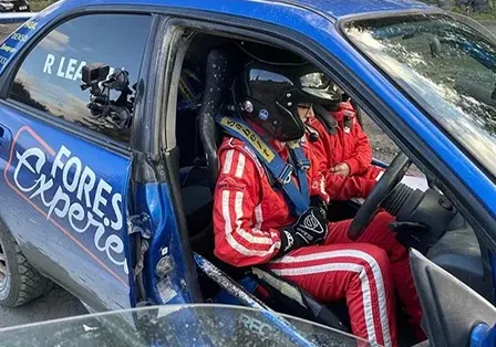 Rally competitor receiving in-car tuition from a Forest Experience instructor