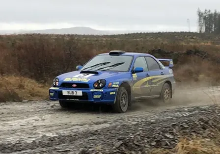 Subaru Impreza rally car on the Forest Experience gravel stage